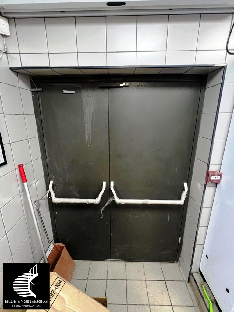 Insulated Steel Fire Protection Door with Emergency Exit Panic Push Bars. Fire Protection Doors, Fire Doors, Fire Rated Doors, Fire Proof Doors, Fire Resistant Doors, Certified Fire Doors. KwaZulu Natal, Durban, Ballito, Hillcrest, Amanzimtoti, Pinetown, Gauteng, Johannesburg, Pretoria, Midrand, South Africa