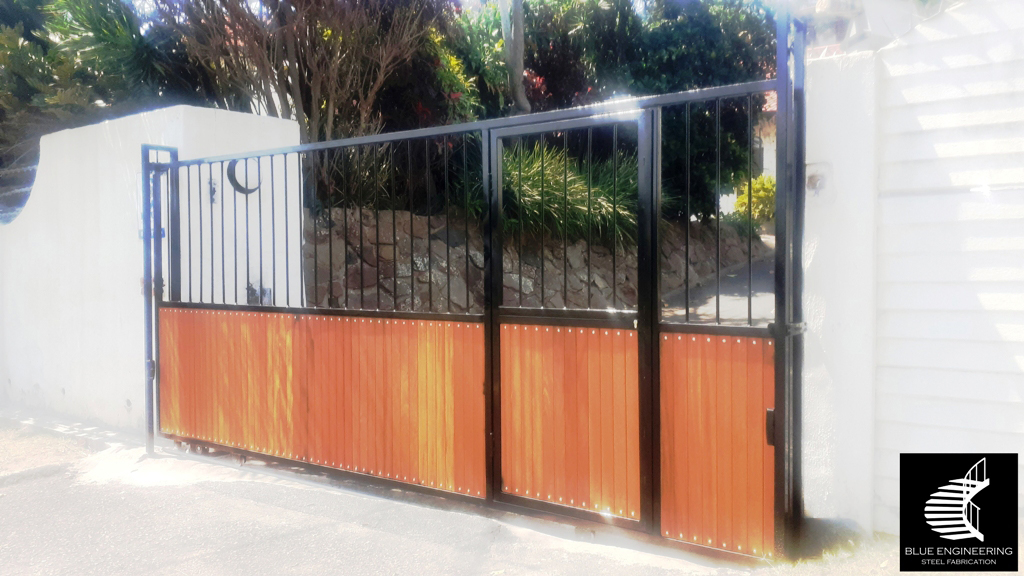 Steel and Wood Sliding Gate wth Built in Pedestrian Gate
