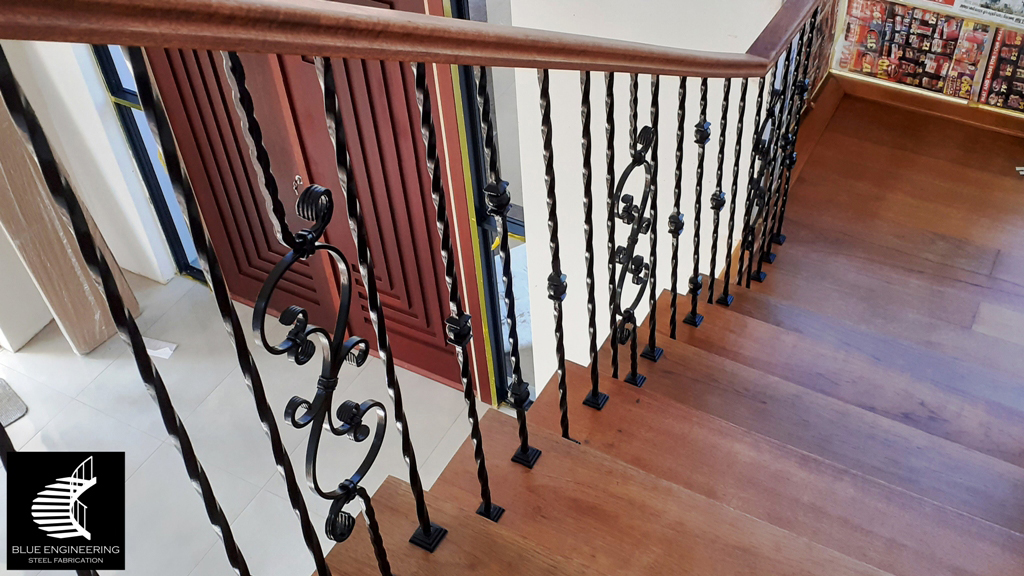 aTimber Clad Staircase with Wrought Iron Balustrades. Wooden Staircases Durban, Timber Staircases Durban, Pine Staircases Durban