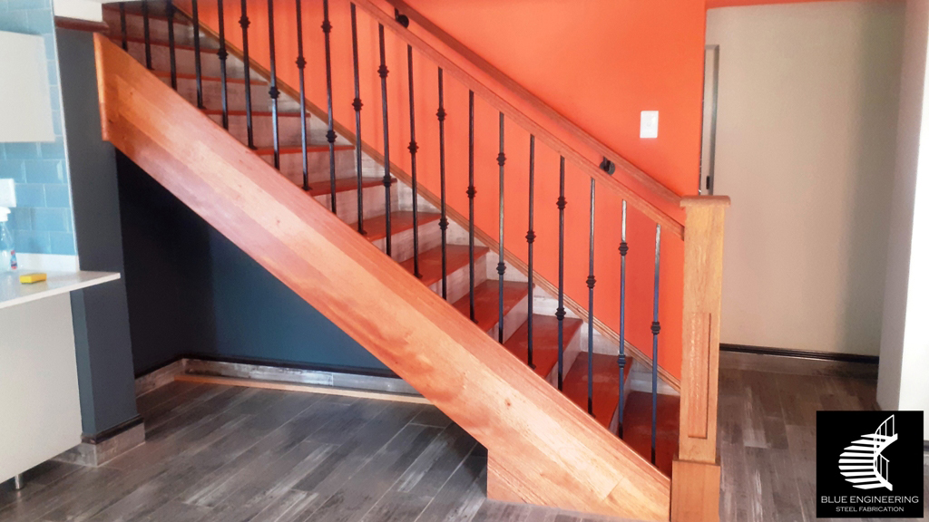 aTimber Clad Staircase with Wrought Iron Balustrades. Wooden Staircases Durban, Timber Staircases Durban, Pine Staircases Durban