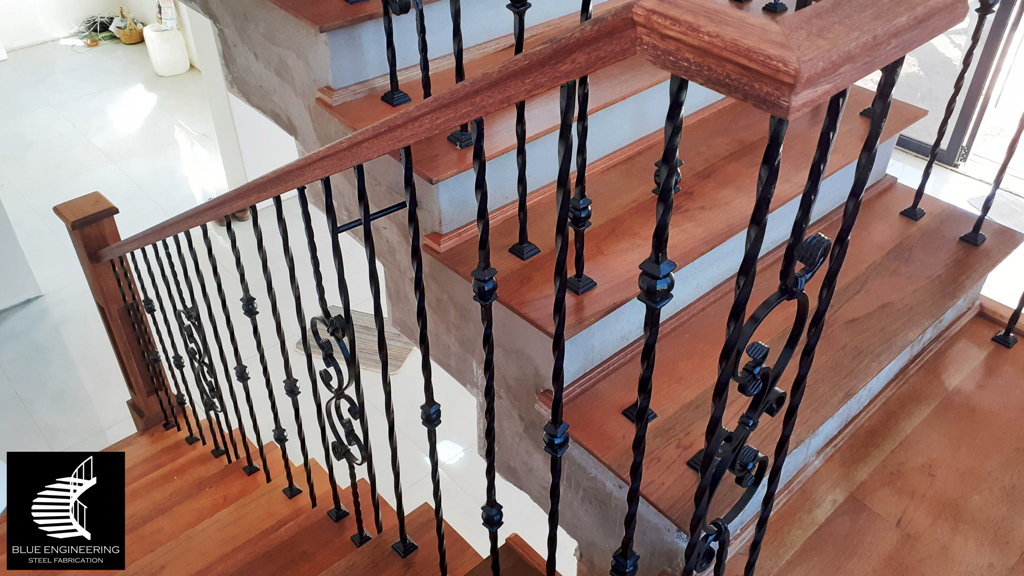 aTimber Clad Staircase with Wrought Iron Balustrades. Wooden Staircases Durban, Timber Staircases Durban, Pine Staircases Durban